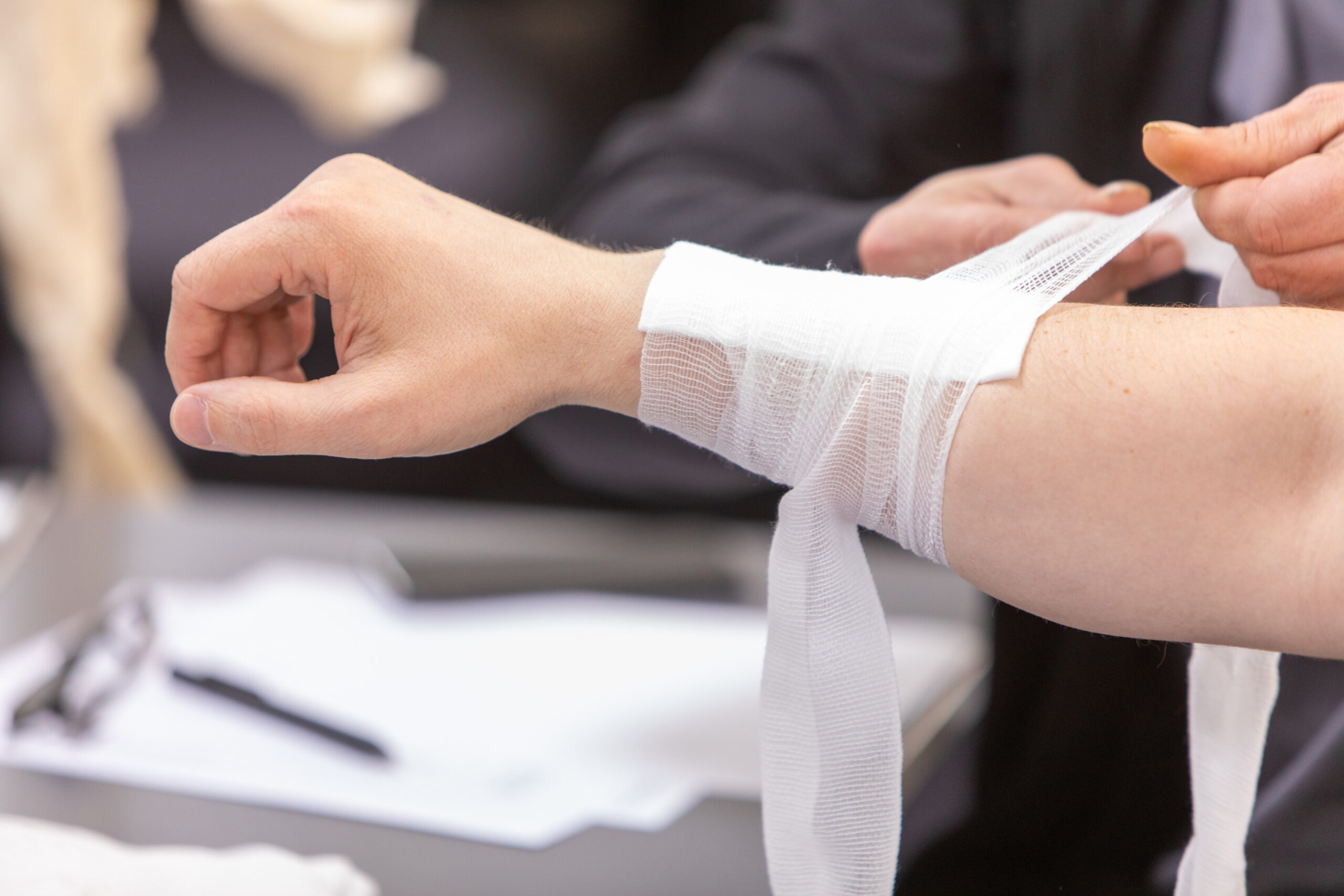 Bandaging practice on an Emergency First Aid at Work course